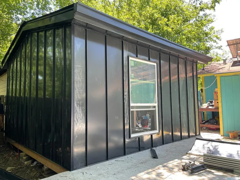 Black standing seam metal wall panels for Roof Inspection in Fort Meade
